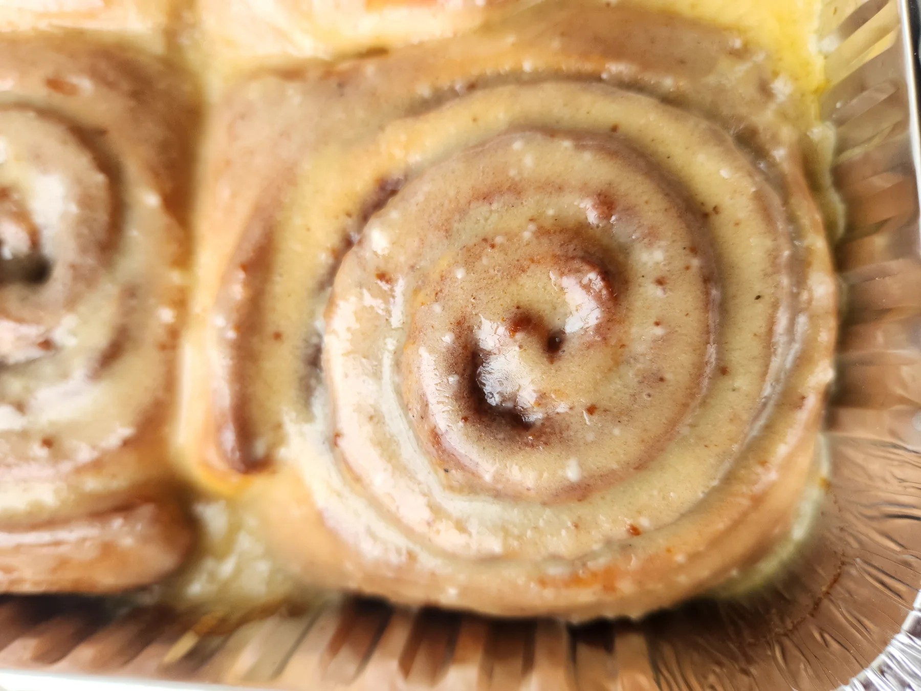 Fresh glazed cinnamon rolls from The Bakers’ Box